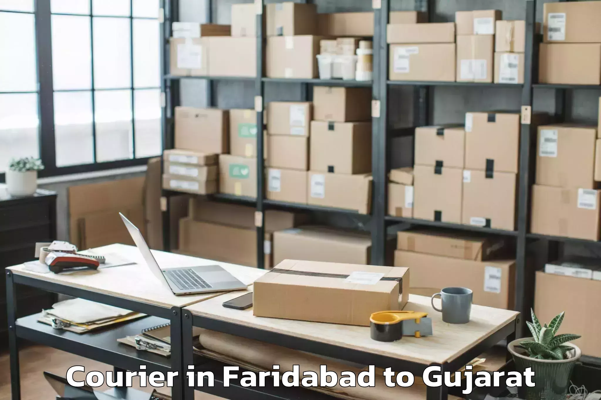 Faridabad to Mendarda Courier